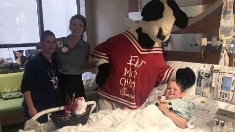 Danny Agee, 10, with his special Chick-fil-A Easter Sunday delivery at McLane Children's Hospital