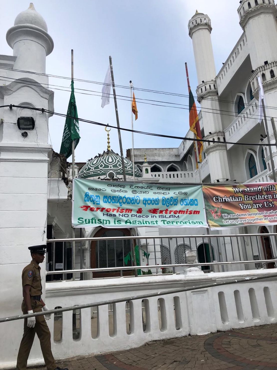 Signs outside the Dewatagaha Mosque in Colombo denounce the Easter Sunday attacks. 