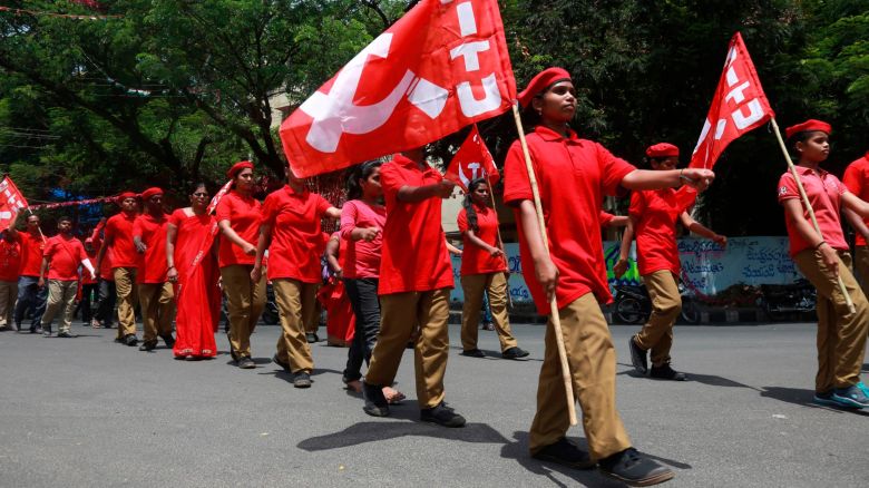 Members of Centre of Indian Trade Union (CITU) march in a rally to mark May Day in Hyderabad, India, Tuesday, May 1, 2018. (AP Photo/Mahesh Kumar A.)