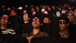 Venezuelan filmgoers watch the first screening in Venezuela of Marvel Studios' "Avengers: Endgame" at a cinema in Caracas on early April 26, 2019. - The "Avengers: Endgame" movie was screened early morning in Caracas to work around blackout and safety issues.