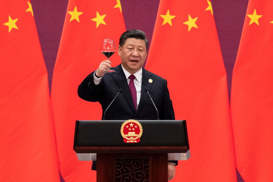 China's President Xi Jinping raises his glass and proposes a toast at the Great Hall of the People in Beijing on April 26.