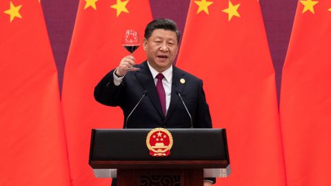 China's President Xi Jinping raises his glass and proposes a toast at the Great Hall of the People in Beijing on April 26.