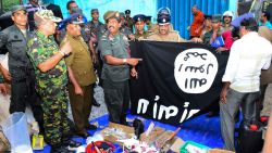 In this picture taken on April 26, 2019, security personnel inspects seized items after they raid what believed to be an Islamist safe house in the eastern town of Kalmunai. - Fifteen people, including six children, died during a raid by Sri Lankan security forces as three cornered suicide bombers blew themselves up and others were shot dead, police said on April 27. (Photo by STRINGER / AFP)        (Photo credit should read STRINGER/AFP/Getty Images)