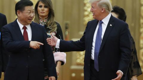 US President Donald Trump and China's President Xi Jinping arrive at a state dinner at the Great Hall of the People on November 9, 2017 in Beijing, China. 