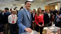 Spanish Prime Minister and Spanish Socialist Party (PSOE) candidate for prime minister Pedro Sanchez casts his ballot next to his wife Begona Gomez at a polling station in Madrid during general elections in Spain on April 28, 2019. - Spain returned to the polls for unpredictable snap elections marked by the resurgence of the far-right after more than four decades on the outer margins of politics. (Photo by JAVIER SORIANO / AFP)        (Photo credit should read JAVIER SORIANO/AFP/Getty Images)