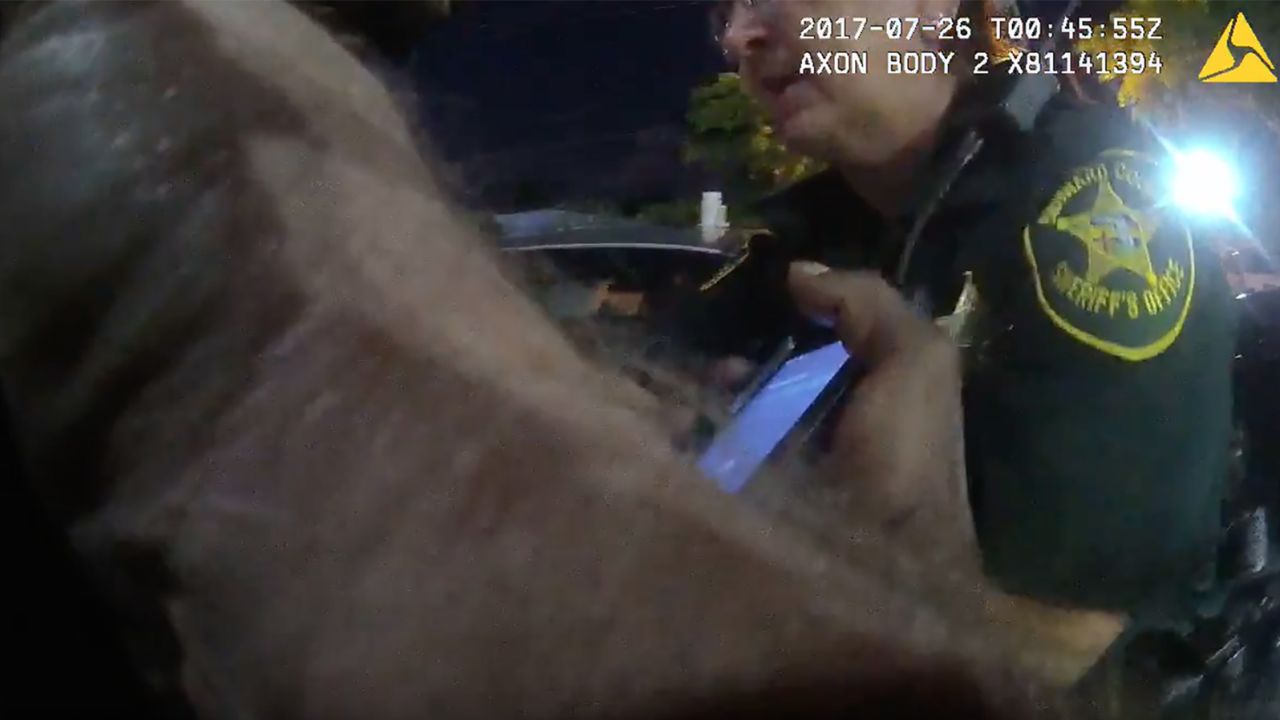 Seen here is a still image from bodycam footage that showed a deputy calling a black father "boy."