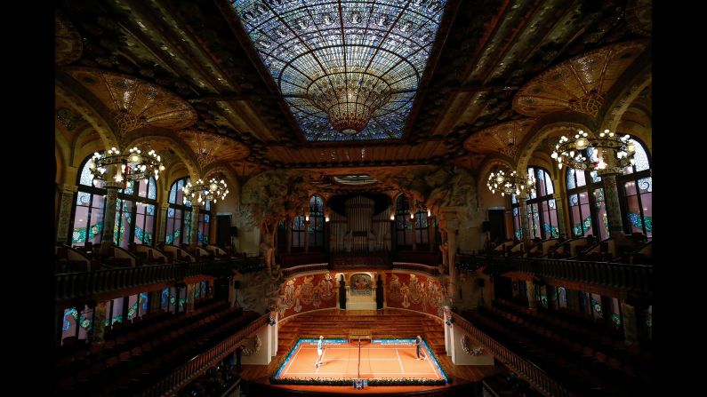 Spain's Rafael Nadal, left, plays against Japan's Kei Nishikori during a promotional tennis match at the Palau de la Musica in Barcelona on Monday, April 22, 2019.