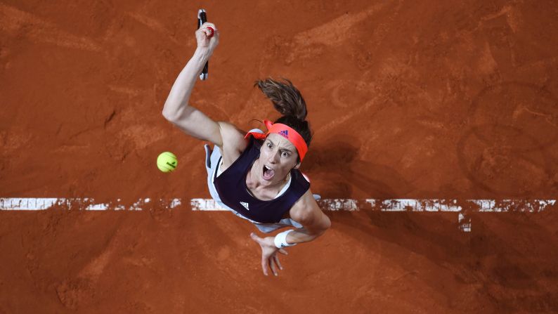 Andrea Petkovic of Germany serves against Sara Sorribes Tormo of Spain at the women's first ground Porsche Grand Prix in Baden-Wuerttemberg, Germany on Tuesday, April 23.
