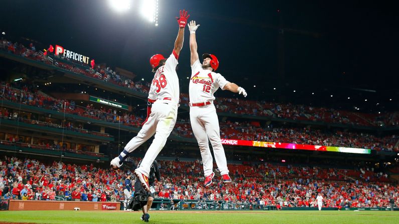 José Martínez of the St. Louis Cardinals, left, congratulates teammate Paul DeJong after he hit a home run against the Milwaukee Brewers in the eighth inning at Busch Stadium in St. Louis, Missouri, on Tuesday, April 23.