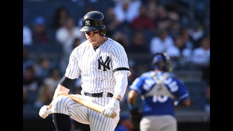 Clint Frazier of the New York Yankees breaks his bat after striking out during the ninth inning of the game against the Kansas City Royals at Yankee Stadium on Sunday, April 21.