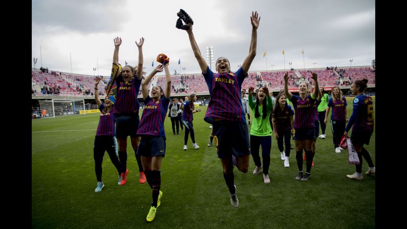 FC Barcelona players celebrate at the end of the Women's Champions League semifinal second leg soccer match between FC Barcelona and Bayern Munich at the Mini Estadi stadium in Barcelona, Spain, on Sunday, April 28.