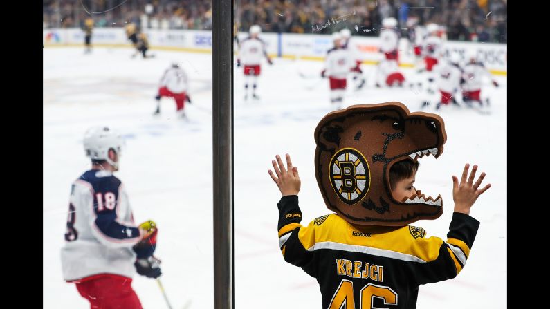 A young fan looks on before a game between the Boston Bruins and the Columbus Blue Jackets in Game Two of the Eastern Conference Second Round during the 2019 NHL Stanley Cup Playoffs at TD Garden in Boston on Saturday, April 27.