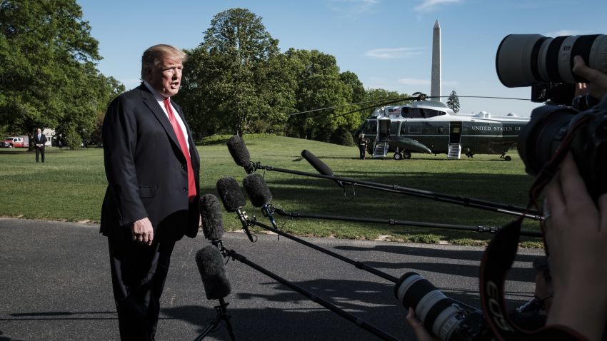WASHINGTON, DC - APRIL 27: President Donald Trump stops to talk to the media about the shooting in a California synagogue as he makes his way to Marine One on the South Lawn of the White House as he travels to Green Bay Wisconsin for a campaign rally on April 27, 2019 in Washington, DC. The President was traveling on the night of the annual White House Correspondents Association dinner in Washington. (Photo by Pete Marovich/Getty Images)