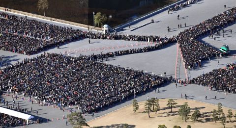 Akihito's final New Year's greetings draws a huge crowd at the Imperial Palace in Tokyo in January 2019.