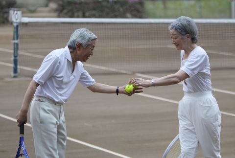 Akihito and Michiko play tennis together in 2010.