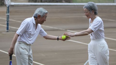 Akihito and Michiko play tennis together in 2010.