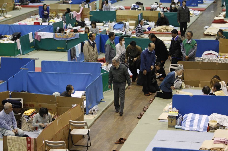 Akihito and Michiko visit an evacuation shelter after the earthquake and tsunami in 2011.