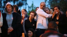Community members and congregants attend a candlelight vigil for the victim of the Chabad of Poway Synagogue shooting on April 28, 2019 in Poway, California. - A rabbi who carried on preaching despite being wounded in the latest deadly shooting at a US synagogue said on April 28 that Jews would not be intimidated by the "senseless hate" of anti-semitism. (Photo by SANDY HUFFAKER / AFP)        (Photo credit should read SANDY HUFFAKER/AFP/Getty Images)