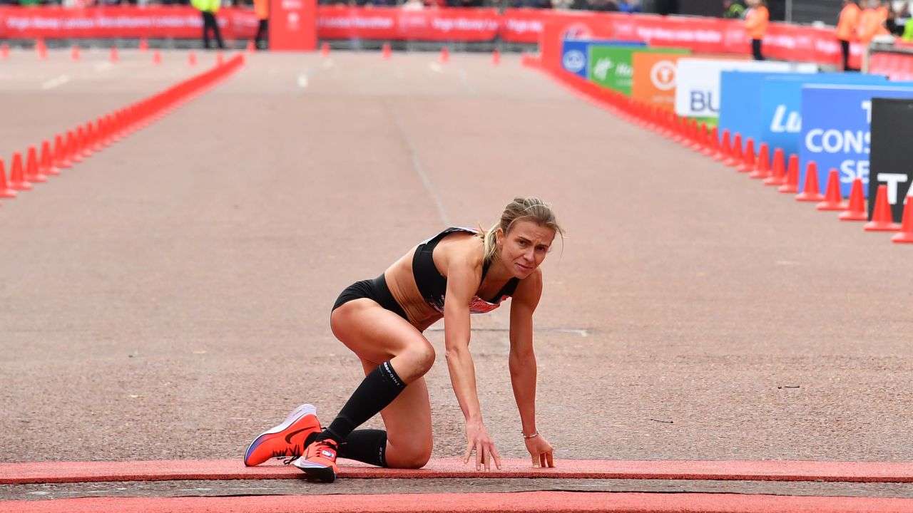 Hayley Carruthers hauls herself over the finish line