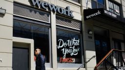 NEW YORK, NEW YORK - MARCH 26: People walk by the co-working space WeWork in the Williamsburg neighborhood in Brooklyn on March 26, 2019 in New York City. WeWork, which lets freelancers and other non-traditional workers to become members in a shared or flexible office space, has expanded globally over the last year but continues to suffer large losses. While in 2018 WeWork saw a more than doubling of its sales to $1.82 billion from a year earlier, the company's losses over that same period also more than doubled to $1.93 billion.  (Photo by Spencer Platt/Getty Images)