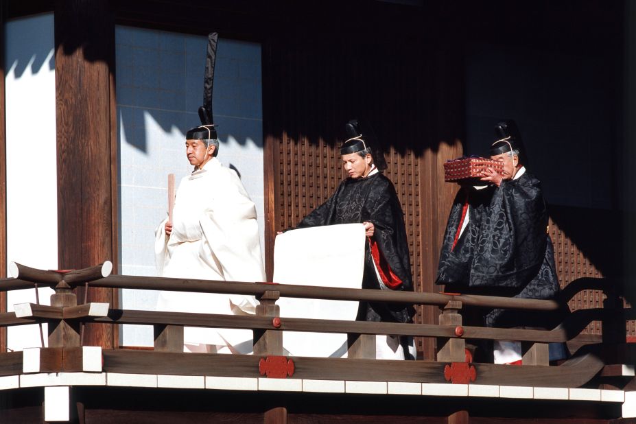 Akihito walks during his enthronement ceremony in 1990. A year and 10 months after the death of his father, Akihito officially became the 125th Emperor of Japan.