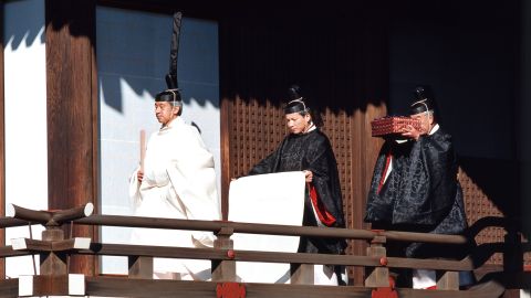 Akihito walks during his enthronement ceremony in 1990. A year and 10 months after the death of his father, Akihito officially became the 125th Emperor of Japan.