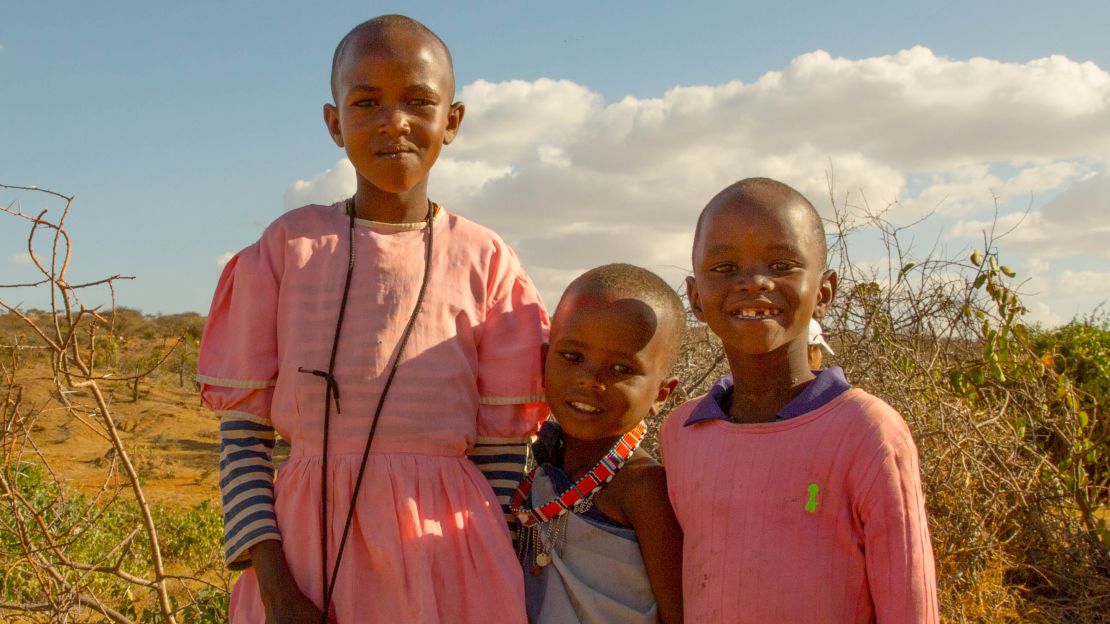 The village children enjoy posing for the cameras. 