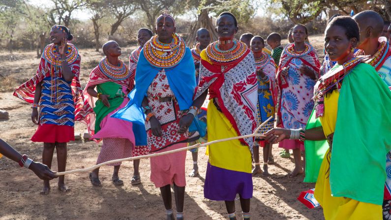 <strong>Welcome: </strong>The villagers welcome their guests with singing and dancing. 