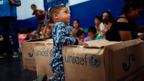 Venezuelan refugees waiting for UNICEF humanitarian supplies in Colombia in April 2019. 
