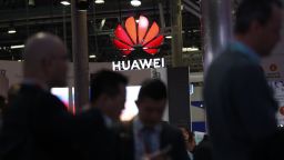 An illuminated logo hangs above the Huawei Technologies Co. pavilion on the opening day of the MWC Barcelona in Barcelona, Spain, on Monday, Feb. 25, 2019. At the wireless industrys biggest conference, over 100,000 people are set to see the latest innovations in smartphones, artificial intelligence devices and autonomous drones exhibited by more than 2,400 companies. Photographer: Stefan Wermuth/Bloomberg via Getty Images
