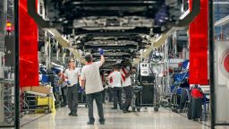 FILE PHOTO: Workers assemble vehicles on the assembly line of the SEAT car factory in Martorell, near Barcelona, Spain, October 31, 2018. REUTERS/Albert Gea/File Photo GLOBAL BUSINESS WEEK AHEAD