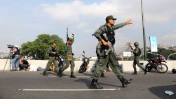 Military members gesture near the Generalisimo Francisco de Miranda Airbase "La Carlota", in Caracas, Venezuela April 30, 2019. REUTERS/Manaure Quintero NO RESALES. NO ARCHIVES