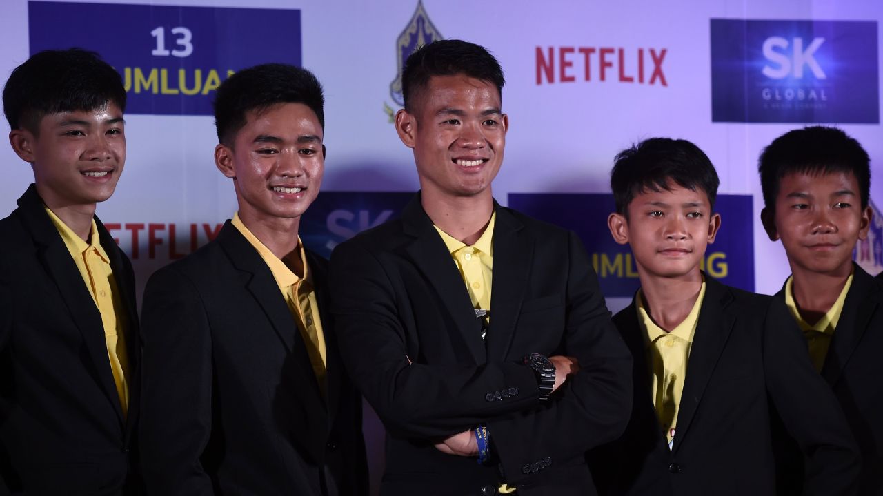 Members of the 'Wild Boars' team pose to promote a Netflix series about the rescue of the team.