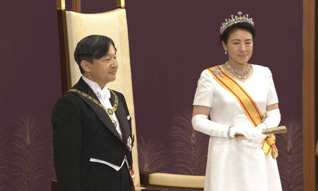 Emperor Naruhito stands with his wife, Empress Masako at a ceremony in the State Hall of Tokyo's Imperial Palace. 