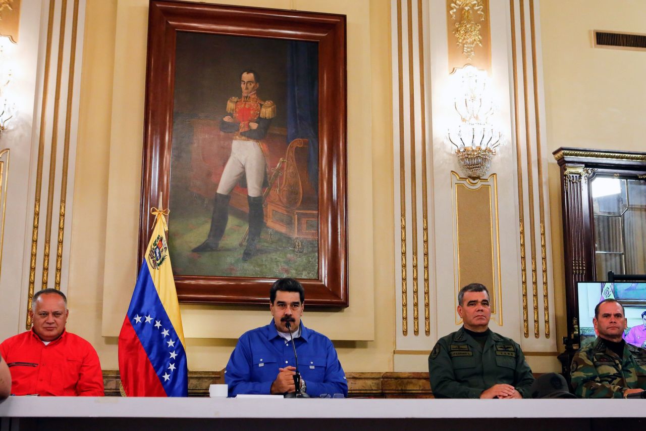 Maduro, center, gives a live televised address on April 30. "We have been facing various forms of coup d'etat, due to the obsessive efforts of the Venezuelan right, the Colombian oligarchy and the US empire," he said. He accused "imperialist" forces of seeking "to attack and overthrow a legitimate government to enslave Venezuela."