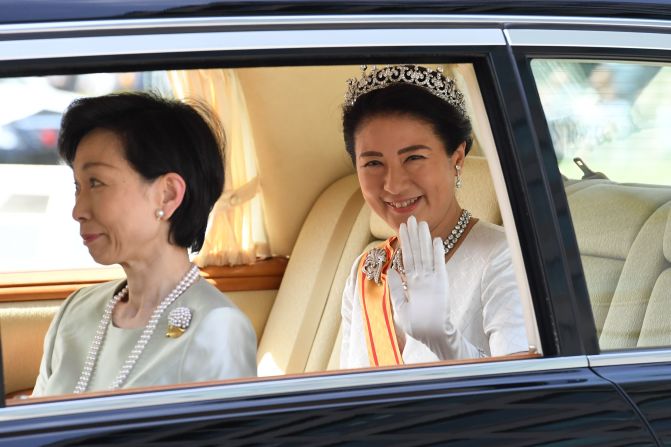 Naruhito's wife, Masako, arrives at the Imperial Palace.