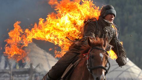 A stuntman performing during the World Nomad Games. Teams from Azerbaijan, Kazakhstan, Belarus, Mongolia and Tajikistan take part in the games.
