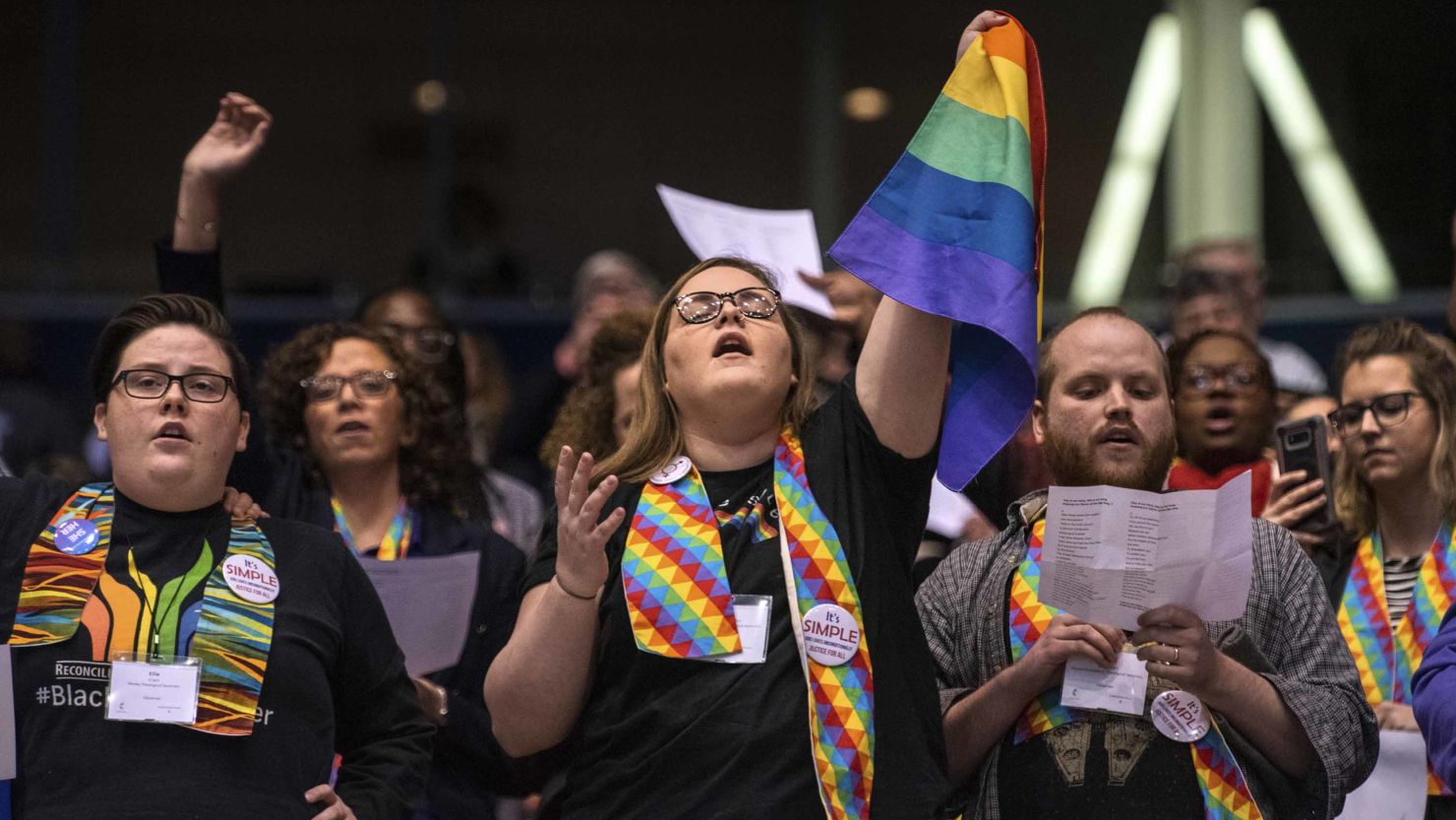 Shelby Ruch-Teegarden, center, of Garrett-Evangelical Theological Seminary joins other protestors during the United Methodist Church's special session of the General Conference in St. Louis, in February.