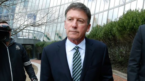 Bruce Isackson departs federal court in Boston on Wednesday, April 3, 2019, after facing charges in a nationwide college admissions bribery scandal.