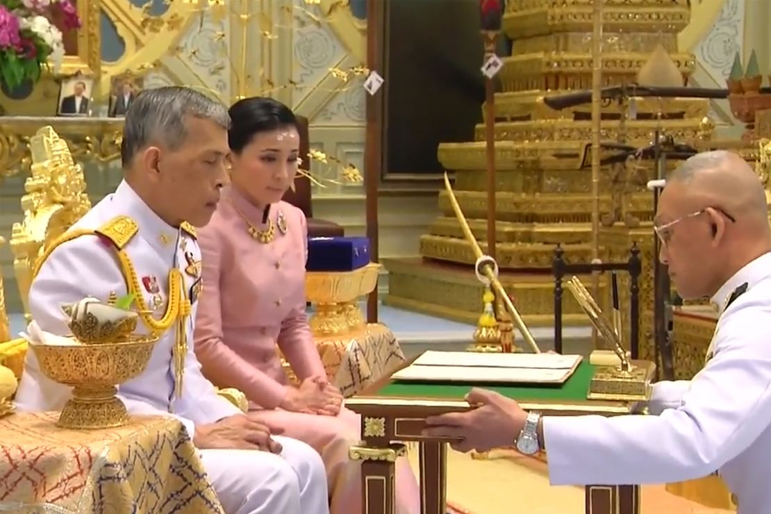 This screengrab from Thai TV Pool video taken on May 1, 2019 shows a ceremony in which Thailand's King Maha Vajiralongkorn (L) "legally married" Suthida Vajiralongkorn na Ayudhya in Bangkok.  