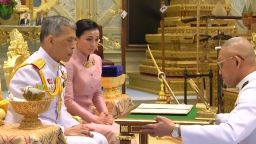 This screengrab from Thai TV Pool video taken on May 1, 2019 shows a ceremony in which Thailand's King Maha Vajiralongkorn (L) "legally married" Suthida Vajiralongkorn na Ayudhya in Bangkok. - Thailand announced on May 1, 2019 that King Maha Vajiralongkorn's long-time consort had become his fourth wife, bestowed with the title Queen Suthida -- a surprise move just days before his coronation. (Photo by Thai TV Pool / THAI TV POOL / AFP)        (Photo credit should read THAI TV POOL/AFP/Getty Images)