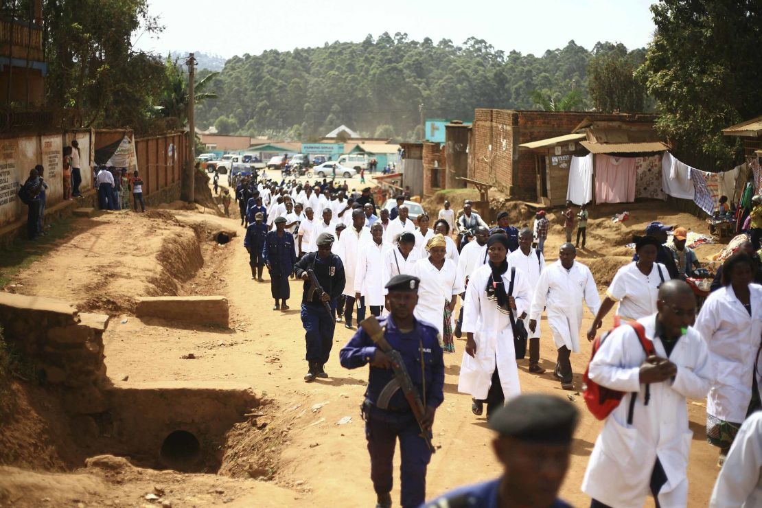 Doctors and health workers march in Butembo in April after attackers killed a WHO epidemiologist.