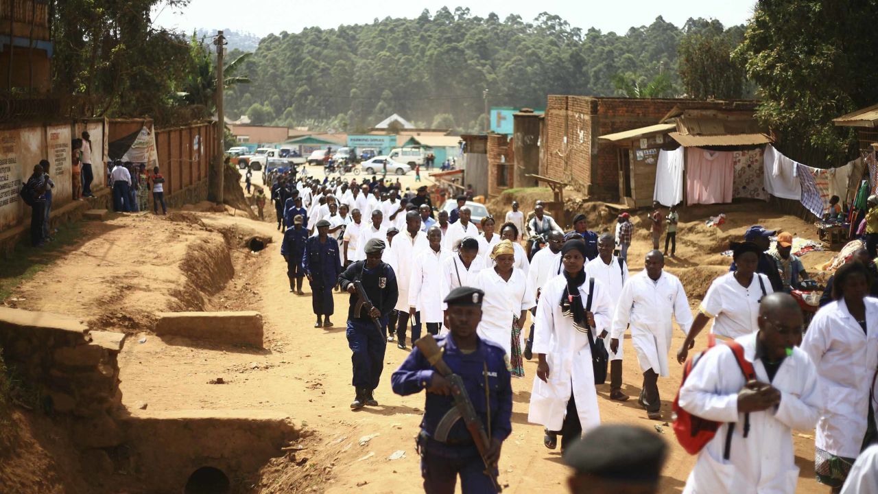 Doctors and health workers march in Butembo in April after attackers killed a WHO epidemiologist.