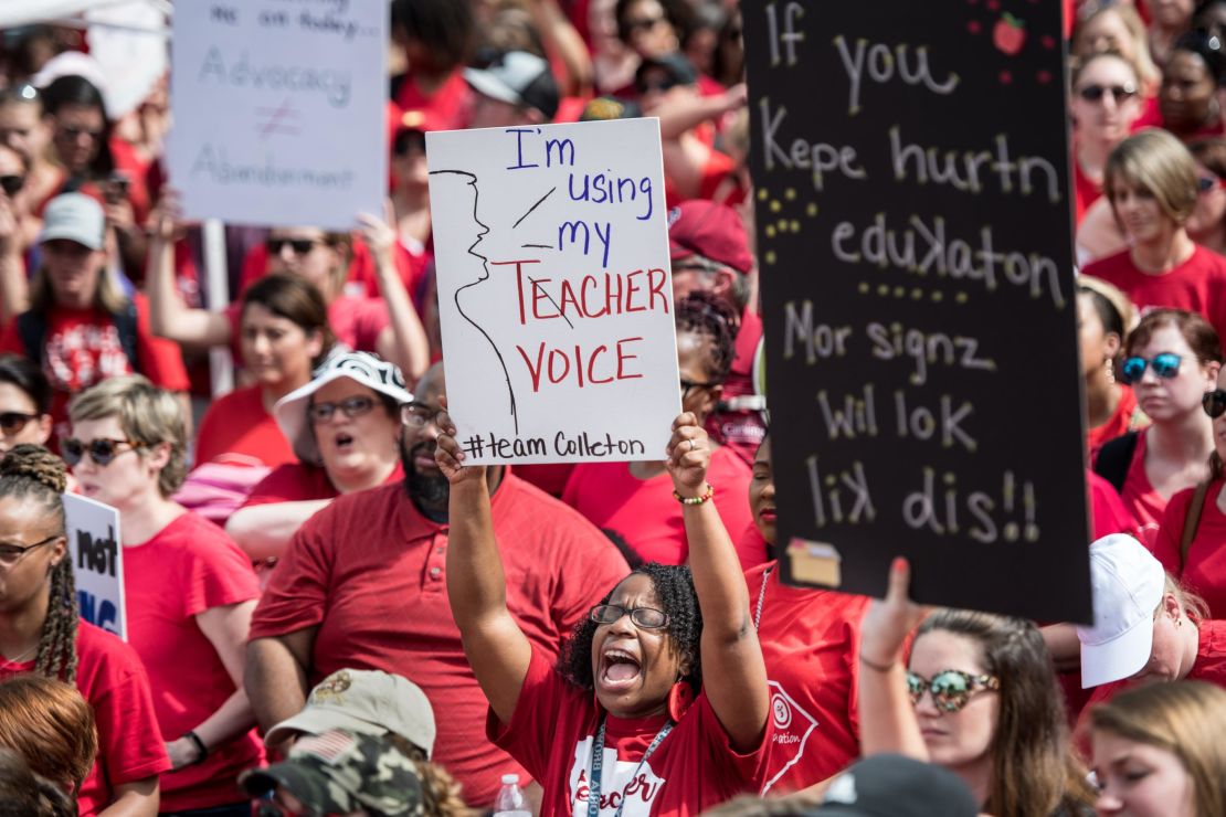 Math teacher Gloria Brown shouts at a rally with South Carolina teachers in Columbia on Wednesday.
