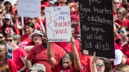 COLUMBIA, SC - MAY 01: Colleton County Middle School math teacher Gloria Brown shouts at a rally with other educators and their supporters at the South Carolina State House on May 1, 2019 in Columbia, South Carolina. Law enforcement estimated 10,000 people gathered at the state capital. (Photo by Sean Rayford/Getty Images)