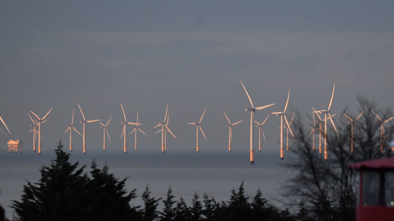 Wind and solar power accounted for 18% of UK electricity generation in 2017. Pictured: Wind turbines stand in the Irish Sea, north Wales, March 2016.