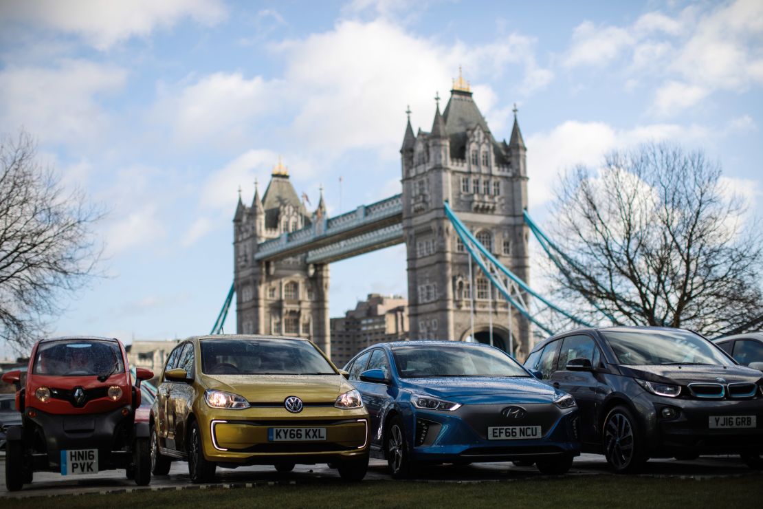 The Committee on Climate Change recommends the UK phase out petrol and diesel cars completely by 2035. 

Pictured: Hybrid and electric cars in London, February 23, 2017.