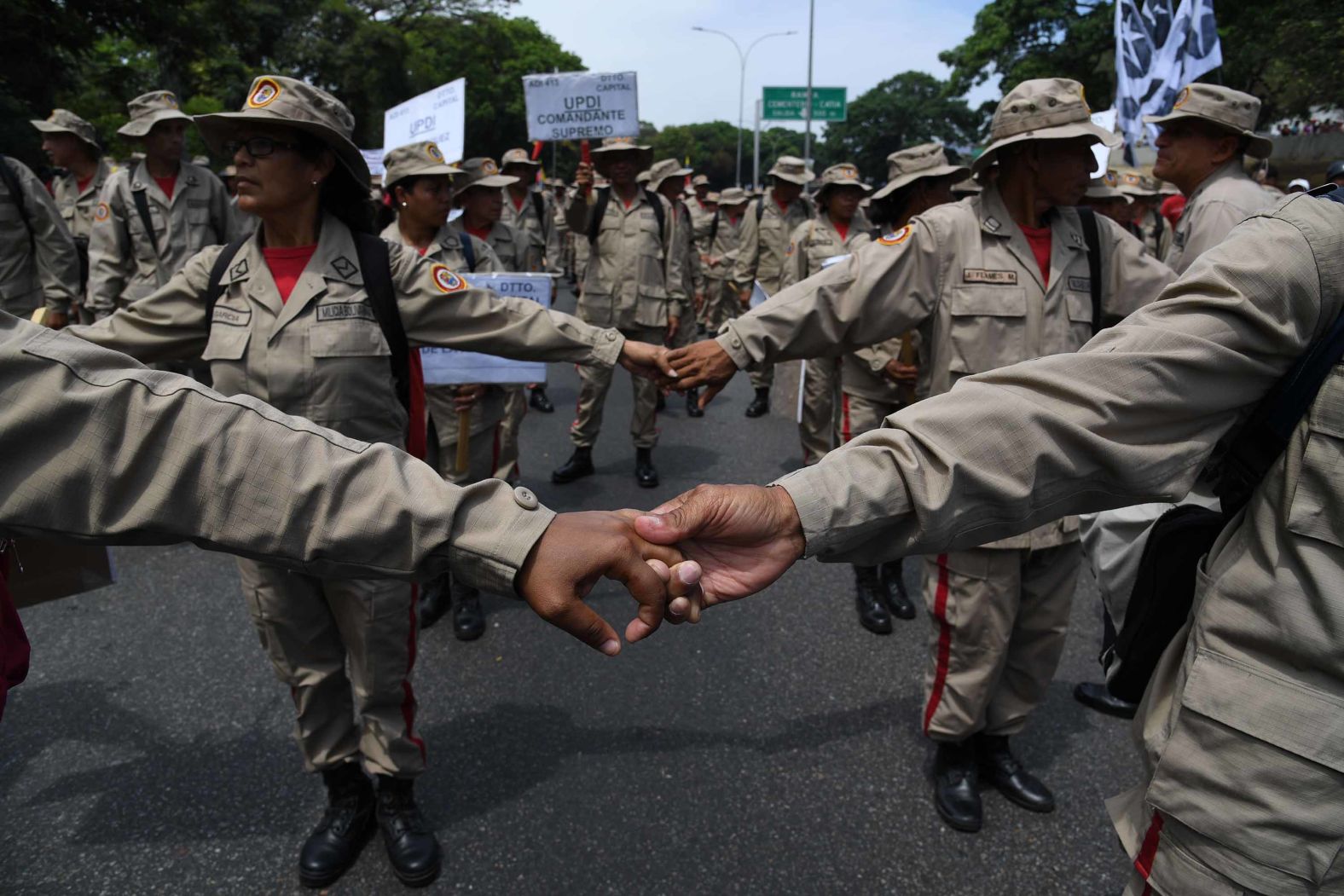 Members of Venezuela's National Militia attend a pro-government rally in Caracas on May 1.