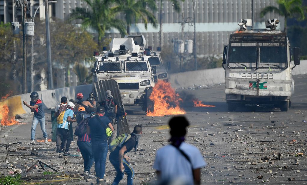 Anti-government protesters clash with security forces during the May Day protests in Caracas.