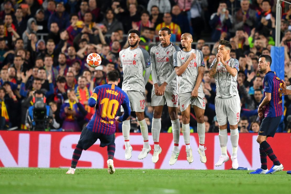 Messi scores his second goal in the 3-0 win over Liverpool.